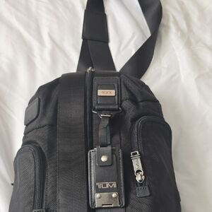 Tumi Black Belt Bag with Sleek Design and Utility